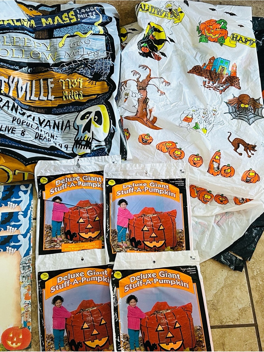 1990's vintage Halloween decor Deluxe Giant Stuff-A-Pumpkin, table cloth, paper